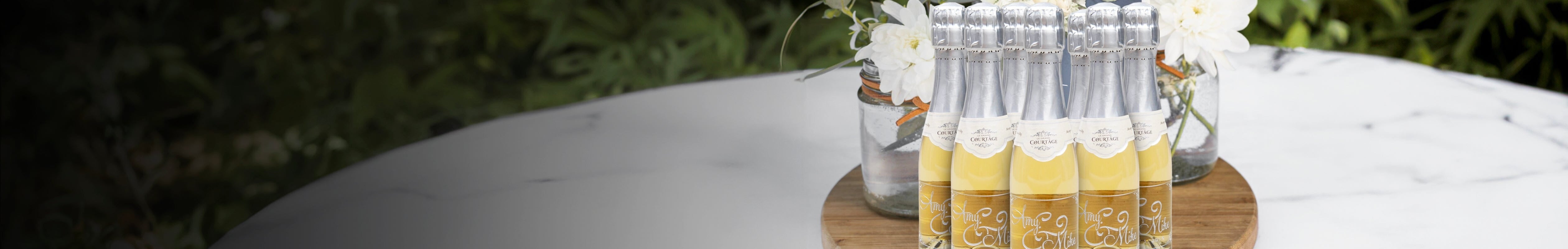 Wedding favors etched mini champagne bottles
