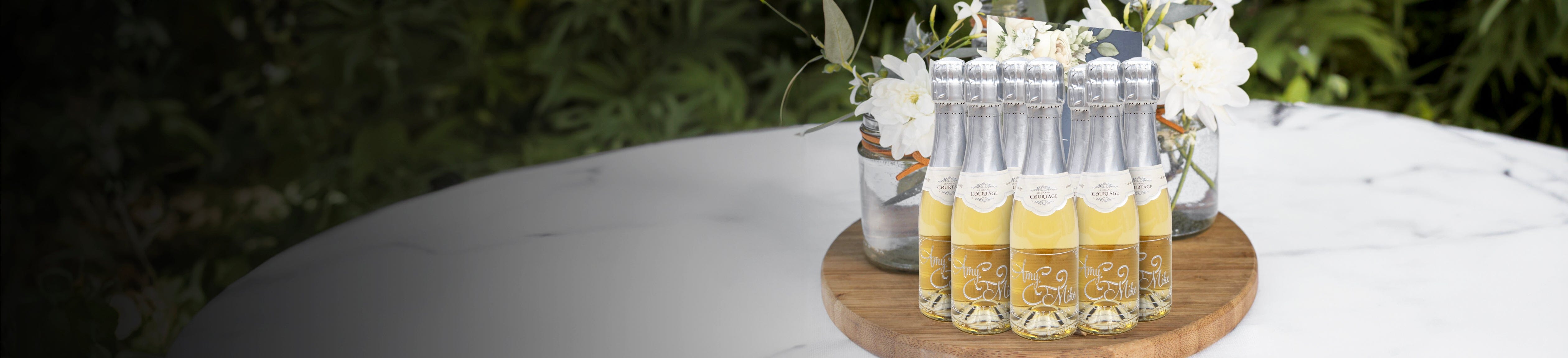 Wedding favors etched mini champagne bottles