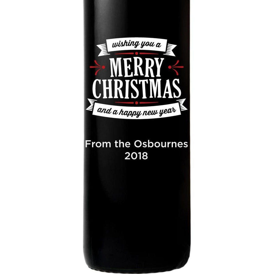 Merry Christmas and a Happy New Year custom etched red wine bottle by Etching Expressions