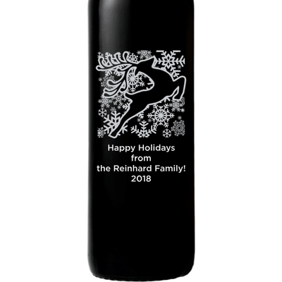 Holiday Reindeer design on a custom wine bottle by Etching Expressions