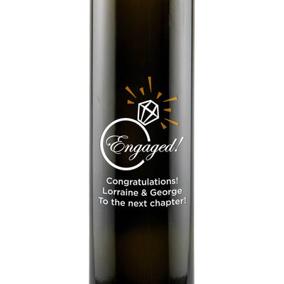 Engaged! with a diamond illustration engraved on an olive oil bottle engagement gift by Etching Expressions